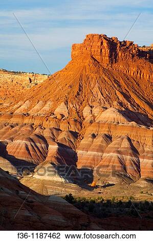 Sunset light on eroded hills and buttes along the Cockscomb, Grand Staircase Escalante National Monument, Utah View Large Photo Image Stock Image - Sunset light on eroded hills and buttes along the Cockscomb, Grand Staircase Escalante National Monument, Utah. Fotosearch