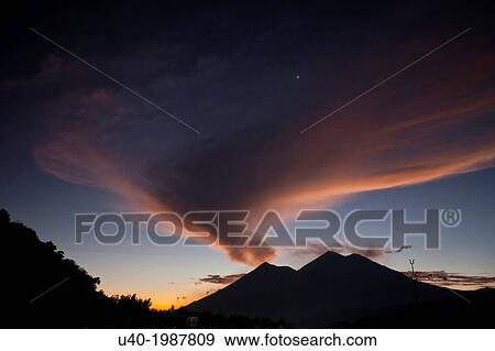 Sunset looking at Volcan de Fuego and Acatenango, Antigua, Guatemala View Large Photo Image Stock Photo - Sunset looking at Volcan de Fuego and Acatenango, Antigua, Guatemala. Fotosearch