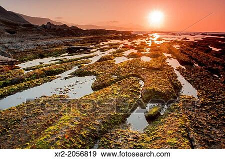 Sunset on Algorri beach, Zumaia, Basque Country. View Large Photo Image Stock Photo - Sunset on Algorri beach, Zumaia, Basque Country.. Fotosearch