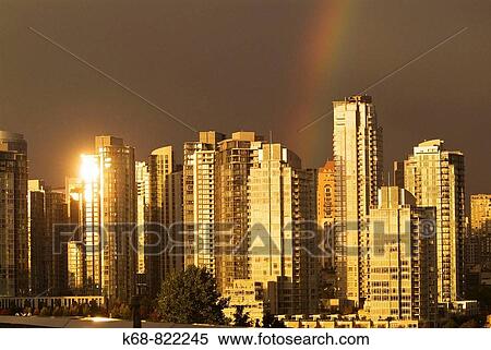Stock Photography - sunset on apartment buildings, False Creek, Vancouver, BC, Canada. Fotosearch