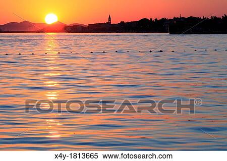 Sunset on Dalmatian coast, village Turanj, Croatia View Large Photo Image Stock Photography - Sunset on Dalmatian coast, village Turanj, Croatia. Fotosearch