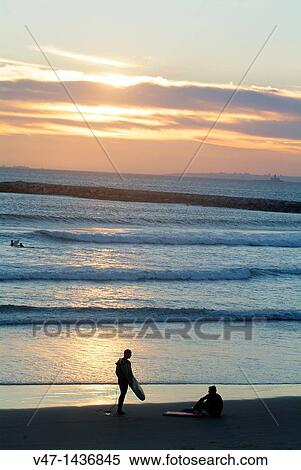 sunset on the beach of Caparica, Caparica, Portugal View Large Photo Image Stock Photography - sunset on the beach of Caparica, Caparica, Portugal. Fotosearch