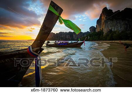 Sunset on the beach Railay Krabi province, Thailand View Large Photo Image Stock Image - Sunset on the beach Railay Krabi province, Thailand. Fotosearch