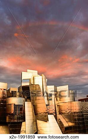 Sunset on the Frederick R. Weisman Art Museum at the University of Minnesota. A stainless steel and brick building designed by architect Frank Gehry, the Weisman Art Museum offers an educational and friendly museum experience. View Large Photo Image Stock Photo - Sunset on the Frederick R. Weisman Art Museum at the University of Minnesota. A stainless steel and brick building designed by architect Frank Gehry, the Weisman Art Museum offers an educational and friendly museum experience.. Fotosearch