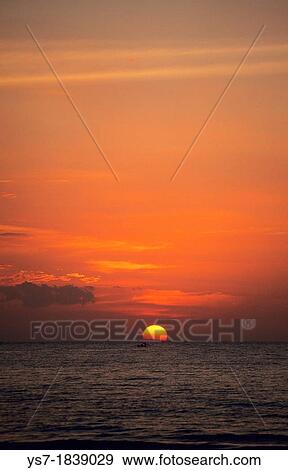 Sunset on the Lovina beach, Bali, Indonesia View Large Photo Image Stock Photo - Sunset on the Lovina beach, Bali, Indonesia. Fotosearch