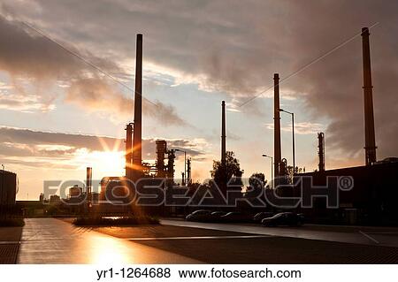 Sunset over an oil refinery in southern germany. View Large Photo Image Stock Photo - Sunset over an oil refinery in southern germany.. Fotosearch