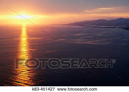 Sunset over Axarqu? a. MBlaga province, Andalusia, Spain View Large Photo Image Stock Photo - Sunset over Axarqu? a. MBlaga province, Andalusia, Spain. Fotosearch