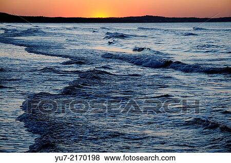 Sunset over Baltic Sea in Swinoujscie, Poland. View Large Photo Image Stock Photo - Sunset over Baltic Sea in Swinoujscie, Poland.. Fotosearch