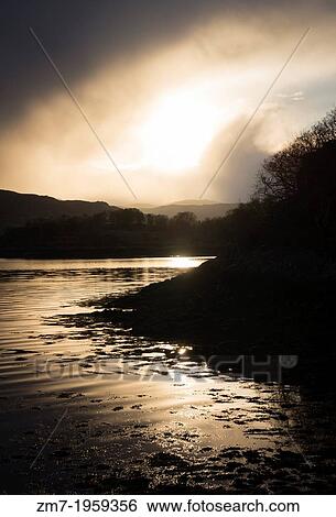 Sunset over Loch Sunart in the Scottish Highlands. View Large Photo Image Stock Photograph - Sunset over Loch Sunart in the Scottish Highlands.. Fotosearch