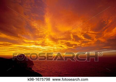 sunset over Nun? Cap, Santa Agn's de Corona, Es Amunts, Ibiza, Balearic Islands, Spain View Large Photo Image Stock Photo - sunset over Nun? Cap, Santa Agn's de Corona, Es Amunts, Ibiza, Balearic Islands, Spain. Fotosearch