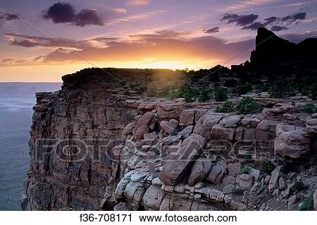 Sunset over red cliffs and mesa at Green River Overlook, Island in the Sky, Canyonlands National Park, Utah, USA View Large Photo Image Stock Image - Sunset over red cliffs and mesa at Green River Overlook, Island in the Sky, Canyonlands National Park, Utah, USA. Fotosearch