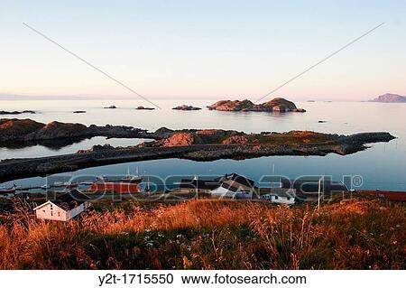 Sunset over the fishing village Hovden on island Langoya, Nordland, Norway View Large Photo Image Stock Image - Sunset over the fishing village Hovden on island Langoya, Nordland, Norway. Fotosearch
