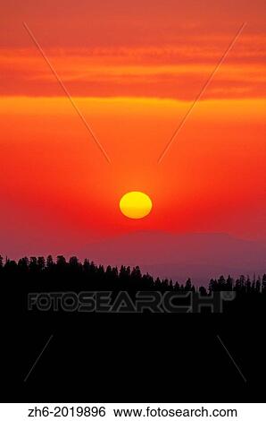 Stock Photograph - Sunset over the Sierra Nevada foothills from Moro Rock, Giant Forest, Sequoia National Park, California USA.. Fotosearch