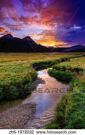Sunset over Tuolumne Meadows along Budd Creek, Yosemite National Park, California USA. View Large Photo Image Stock Image - Sunset over Tuolumne Meadows along Budd Creek, Yosemite National Park, California USA.. Fotosearch
