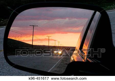 sunset reflection in car mirror View Large Photo Image Stock Photo - sunset reflection in car mirror. Fotosearch