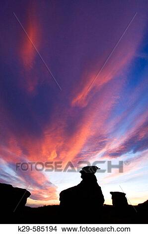 Sunset skies over sandstone hoodoos in Milk River Valley. Writing On Stone Provincial Park. Alberta View Large Photo Image Picture - Sunset skies over sandstone hoodoos in Milk River Valley. Writing On Stone Provincial Park. Alberta. Fotosearch