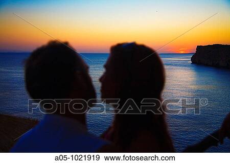 Sunset view from Cova d? en Xoroi, Cala en Porter, Minorca, Balearic Islands, Spain View Large Photo Image Stock Photo - Sunset view from Cova d? en Xoroi, Cala en Porter, Minorca, Balearic Islands, Spain. Fotosearch