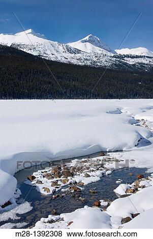Sunwapta River in winter, Jasper National Park Alberta Canada View Large Photo Image Stock Photo - Sunwapta River in winter, Jasper National Park Alberta Canada. Fotosearch