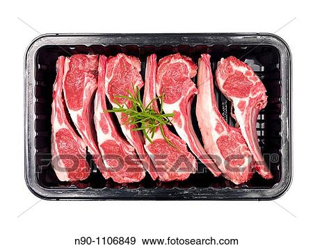Supermarket packaged lamb chops isolated against a white background View Large Photo Image Stock Photo - Supermarket packaged lamb chops isolated against a white background. Fotosearch