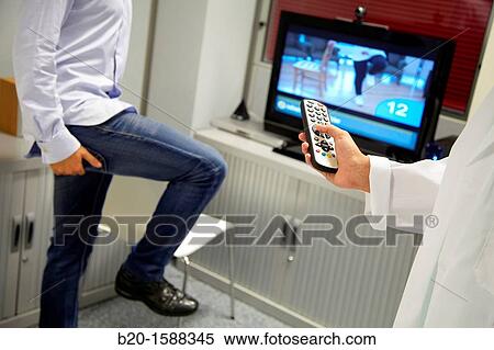 Stock Photography - Supervision of rehabilitation exercises using videos. Fotosearch