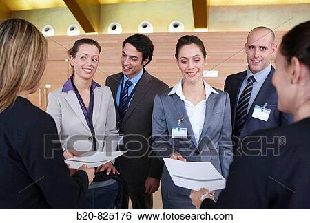 Stock Photograph - Supplying documentation to conventioneers, convention center, Kursaal Center. San Sebastian, Guipuzcoa, Basque Country, Spain. Fotosearch