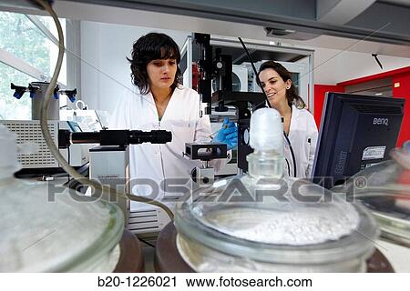 Stock Image - Surface analysis and materials characterization in Polymer Laboratory. Fotosearch