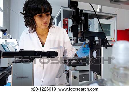 Stock Photo - Surface analysis and materials characterization in Polymer Laboratory. Fotosearch