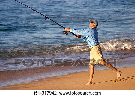 Stock Image - Surfcasting at Playa Solmar in early evening, beach. Cabo San Lucas. Mexico. Fotosearch