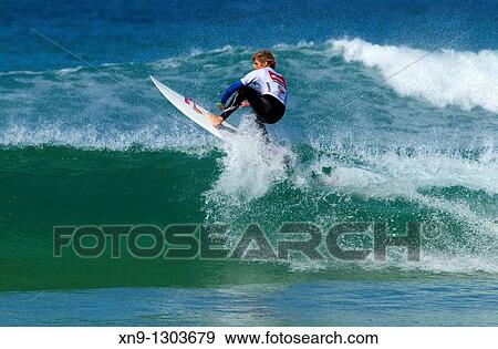 Surfer in Hossegor, Quiksilver Pro France, South West Coast, France. View Large Photo Image Stock Photo - Surfer in Hossegor, Quiksilver Pro France, South West Coast, France.. Fotosearch