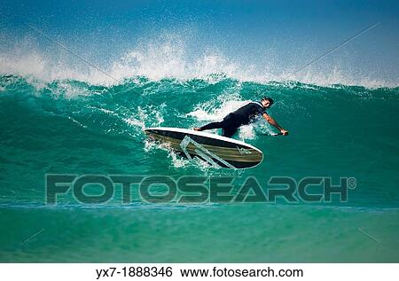 Surfer in trouble. Man falling down from his stand up paddle surf board. Tarifa, Costa de la Luz, Cadiz, Andalusia, Spain, Europe. View Large Photo Image Stock Photograph - Surfer in trouble. Man falling down from his stand up paddle surf board. Tarifa, Costa de la Luz, Cadiz, Andalusia, Spain, Europe.. Fotosearch