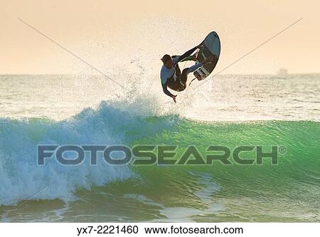 Stock Image - Surfer. Tarifa, Cadiz, Costa de la Luz, Andalusia, Spain, Europe.. Fotosearch