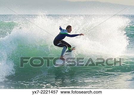Stock Photo - Surfer. Tarifa, Cadiz, Costa de la Luz, Andalusia, Spain, Europe.. Fotosearch