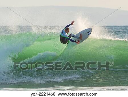 Stock Photo - Surfer. Tarifa, Cadiz, Costa de la Luz, Andalusia, Spain, Europe.. Fotosearch