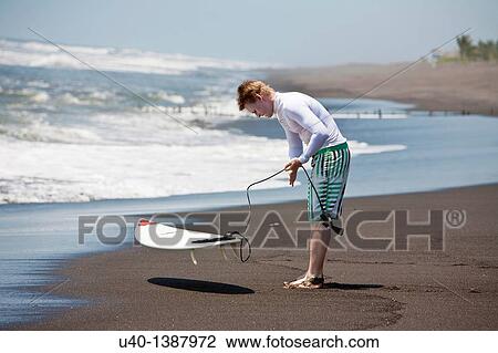 Surfer with board View Large Photo Image Stock Image - Surfer with board. Fotosearch