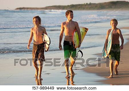 Surfers in Costa Rica, Central America View Large Photo Image Stock Photo - Surfers in Costa Rica, Central America. Fotosearch