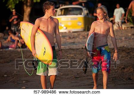 Surfers in Dominical, Costa Rica, Central America View Large Photo Image Stock Photograph - Surfers in Dominical, Costa Rica, Central America. Fotosearch