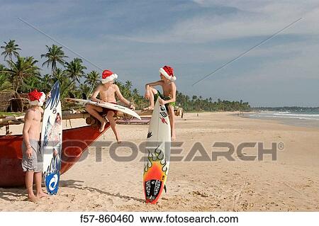 Surfers in Hikkaduwa, Sri Lanka View Large Photo Image Stock Image - Surfers in Hikkaduwa, Sri Lanka. Fotosearch