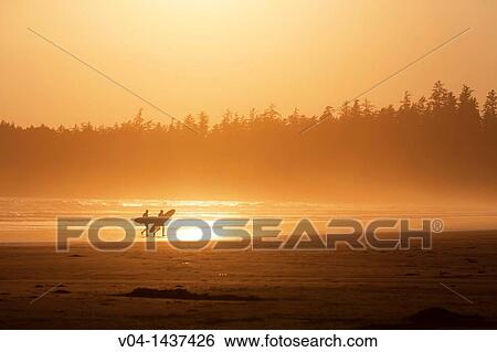 Surfers on a beach, Vancouver Island, British Columbia, Canada View Large Photo Image Stock Photograph - Surfers on a beach, Vancouver Island, British Columbia, Canada. Fotosearch