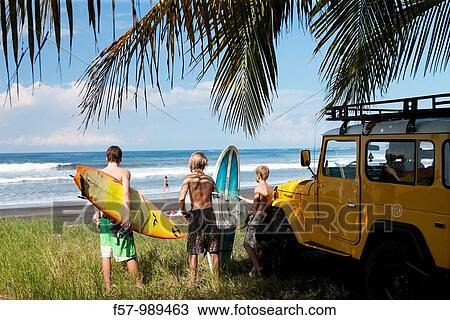 Surfers on Marbella Beach in Costa Rica, Central America View Large Photo Image Stock Image - Surfers on Marbella Beach in Costa Rica, Central America. Fotosearch