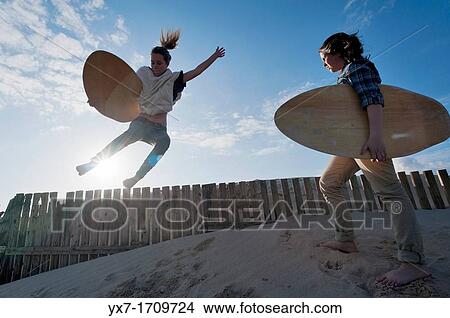 Surfers, Tarifa, Costa de la Luz, Cadiz, Andalusia, Spain View Large Photo Image Picture - Surfers, Tarifa, Costa de la Luz, Cadiz, Andalusia, Spain. Fotosearch