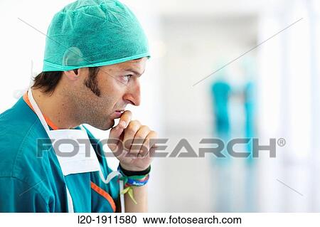 Stock Image - surgeon in the operating room hallway, Onkologikoa Hospital, Oncology Institute, Case Center for prevention, diagnosis and treatment of cancer, Donostia, San Sebastian, Gipuzkoa, Basque Country, Spain. Fotosearch