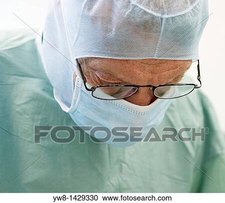 Surgeon performing heart bypass surgery, Reykjavik Iceland View Large Photo Image Stock Image - Surgeon performing heart bypass surgery, Reykjavik Iceland. Fotosearch