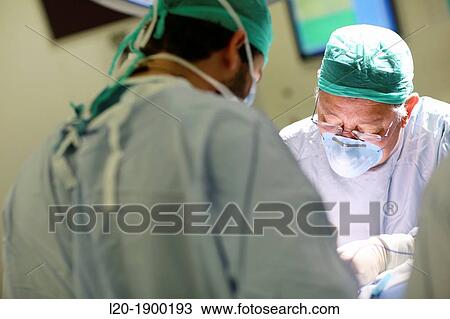 Stock Image - Surgeon, Surgery, Operating room, Onkologikoa Hospital, Oncology Institute, Case Center for prevention, diagnosis and treatment of cancer, Donostia, San Sebastian, Gipuzkoa, Basque Country, Spain. Fotosearch