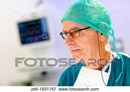 Stock Photo - Surgeon, Surgery, Operating room, Onkologikoa Hospital, Oncology Institute, Case Center for prevention, diagnosis and treatment of cancer, Donostia, San Sebastian, Gipuzkoa, Basque Country, Spain. Fotosearch