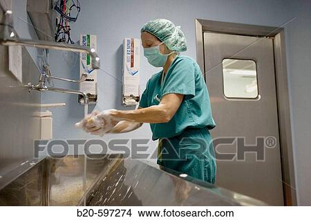 Picture - Surgeon washing hands, traumatology operation room. Hospital de Zumarraga, Gipuzkoa, Euskadi, Spain. Fotosearch