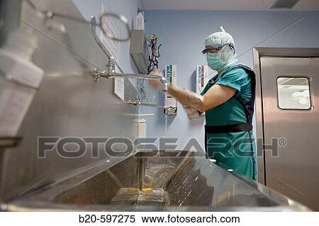 Surgeon washing hands, traumatology operation room. Hospital de Zumarraga, Gipuzkoa, Euskadi, Spain View Large Photo Image Stock Photography - Surgeon washing hands, traumatology operation room. Hospital de Zumarraga, Gipuzkoa, Euskadi, Spain. Fotosearch