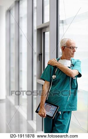 surgeon with tablet in the operating room hallway, Onkologikoa Hospital, Oncology Institute, Case Center for prevention, diagnosis and treatment of cancer, Donostia, San Sebastian, Gipuzkoa, Basque Country, Spain View Large Photo Image Stock Photo - surgeon with tablet in the operating room hallway, Onkologikoa Hospital, Oncology Institute, Case Center for prevention, diagnosis and treatment of cancer, Donostia, San Sebastian, Gipuzkoa, Basque Country, Spain. Fotosearch