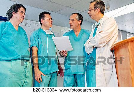 Picture - Surgeons at surgery area of hospital. Fotosearch