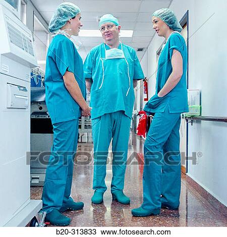 Surgeons at surgery area of hospital View Large Photo Image Stock Image - Surgeons at surgery area of hospital. Fotosearch