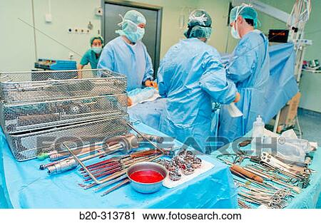 Surgeons at traumatology operating room of hospital View Large Photo Image Stock Image - Surgeons at traumatology operating room of hospital. Fotosearch